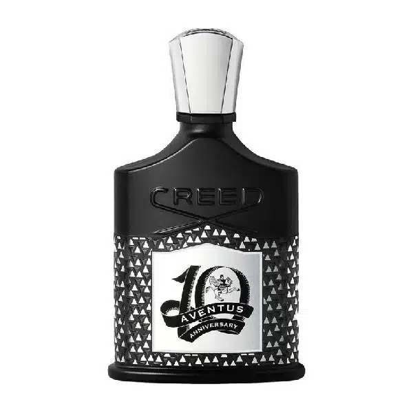 Elegant black Creed 10th Anniversary perfume bottle with intricate design.