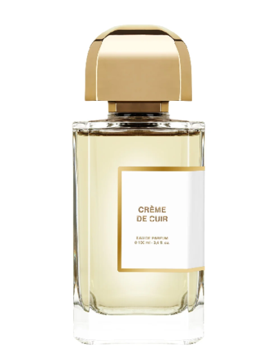 Elegant perfume bottle with gold cap and clear glass.