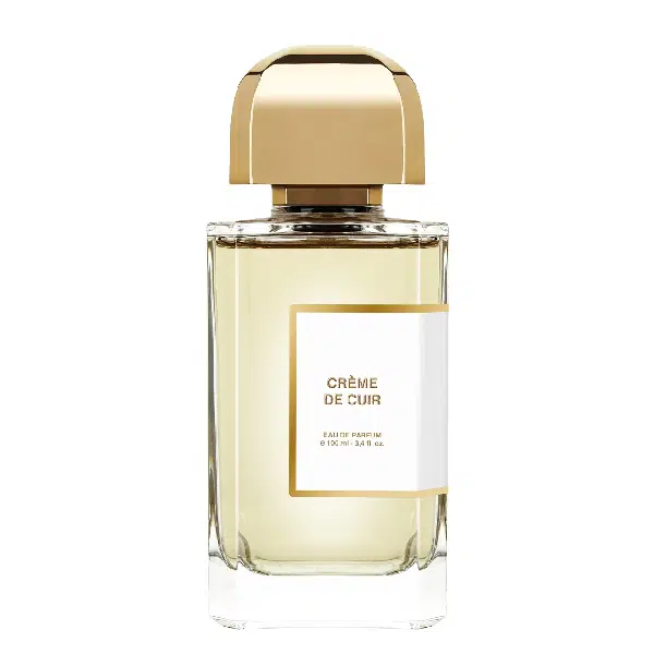 Elegant perfume bottle with gold cap and clear glass.