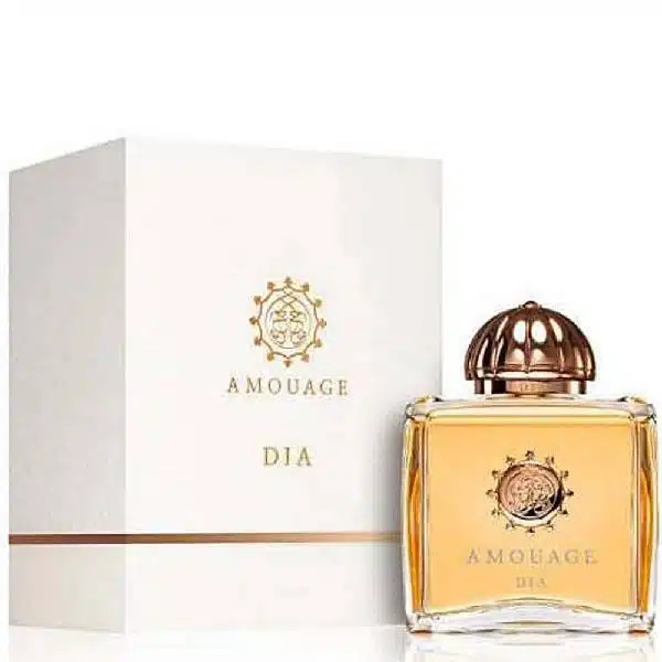 Amber-colored perfume bottle with white box packaging.