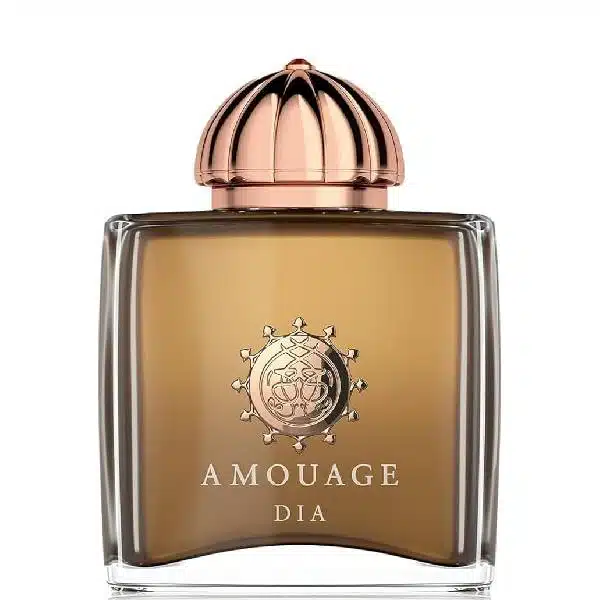 A bottle of Amouage Dia perfume with a gold and copper-toned cap.