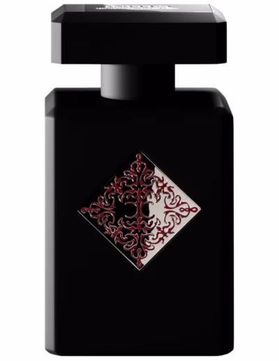 Black perfume bottle with red filigree emblem