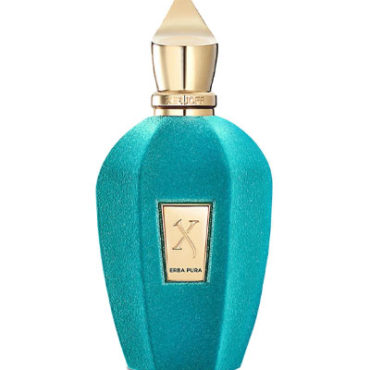 Elegant turquoise perfume bottle with gold cap and label.