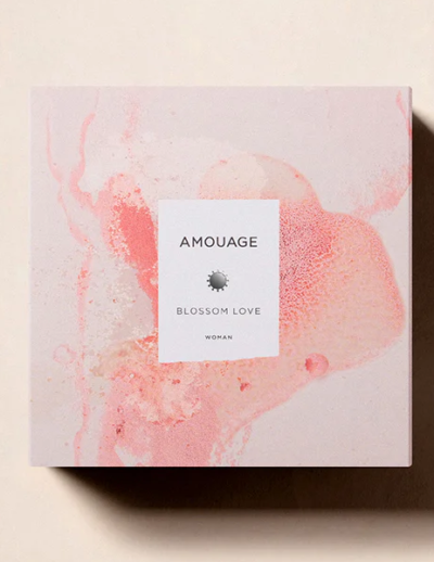 Elegant pink and white marbled box with minimalist design.