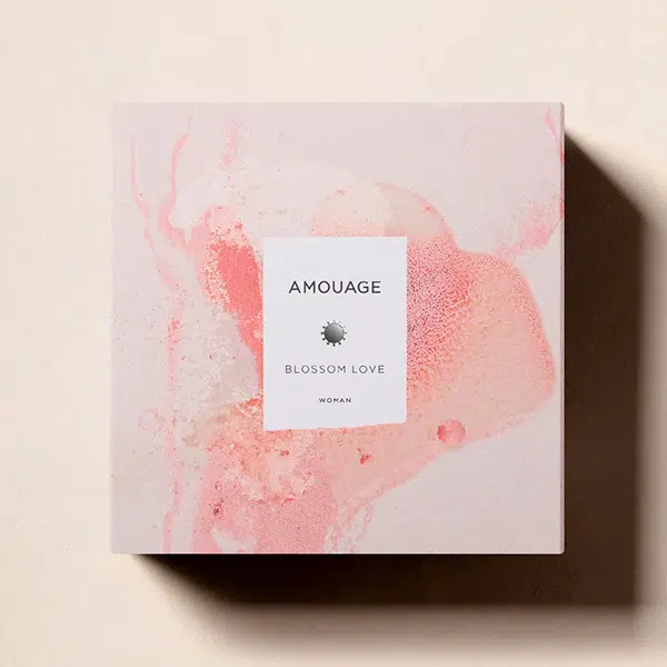 Elegant pink and white marbled box with minimalist design.