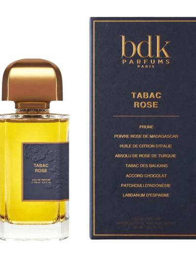 A bottle of BDK Parfums Tabac Rose perfume with its elegant box.