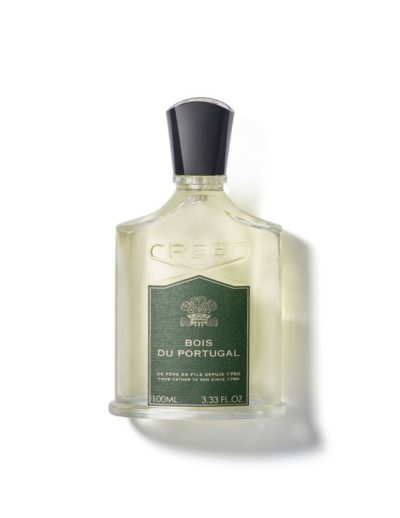 Elegant bottle of Acqua Di Parma Colonia perfume with black cap.