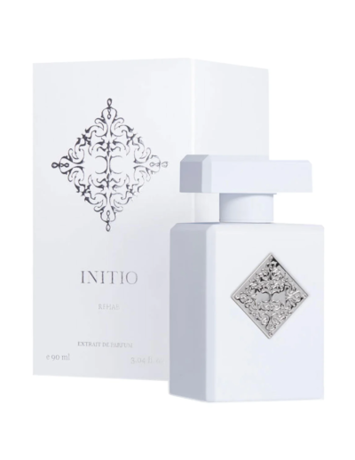 Elegant white Initio perfume bottle with matching box and intricate silver label.