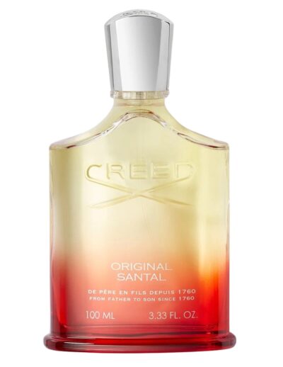 A stylish Creed Aventus cologne bottle with a gradient red-to-clear design.