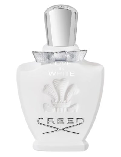 A white Creed perfume bottle with a silver cap and embossed logo.
