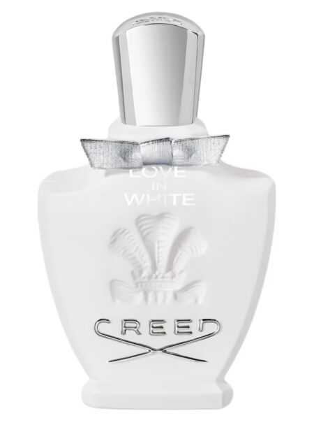 A white Creed perfume bottle with a silver cap and embossed logo.