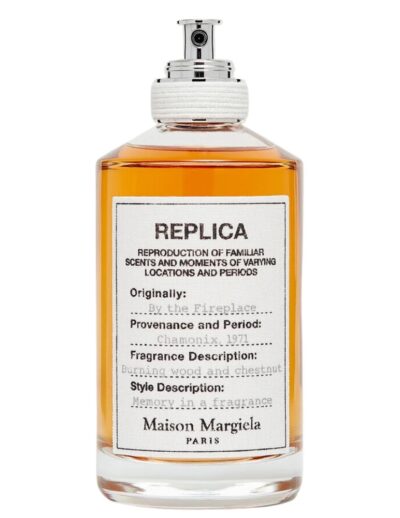 Bottle of Maison Margiela Replica fragrance with a white label.