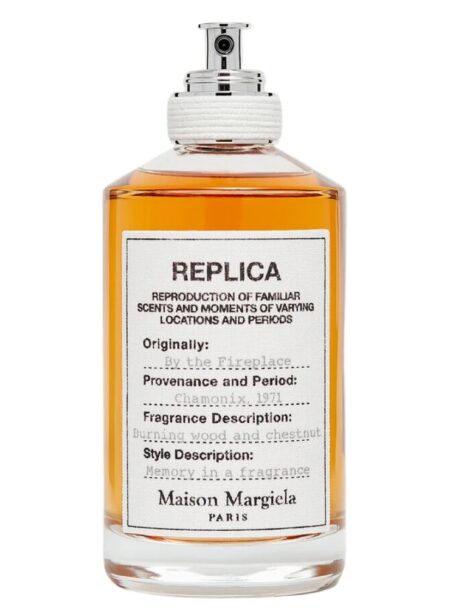 Bottle of Maison Margiela Replica fragrance with a white label.