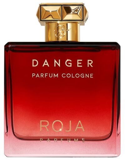 A luxurious red Roja perfume bottle with gold cap labeled 'Danger'.