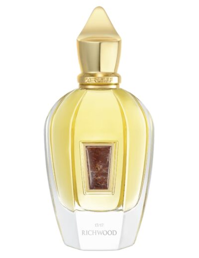 Elegant golden perfume bottle with a unique crystal-like stopper.