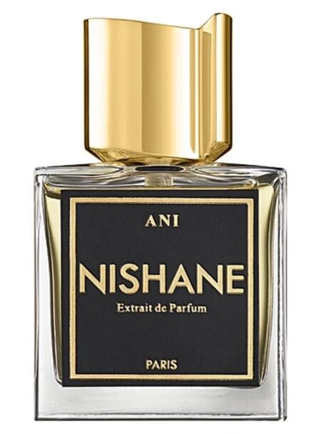 A bottle of Nishane Ani perfume with a gold cap.
