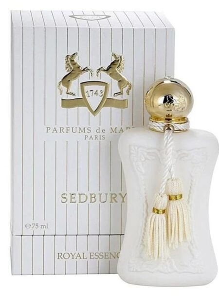 Elegant white and gold bottle of Patou Joy perfume.